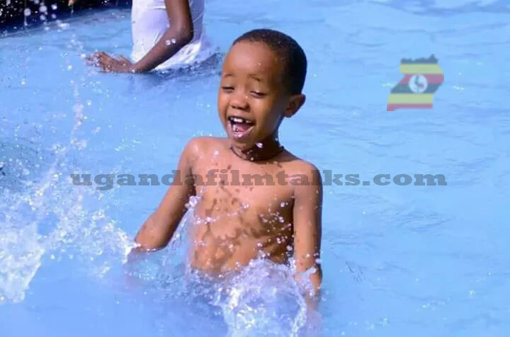 Fresh kid swimming for the first time